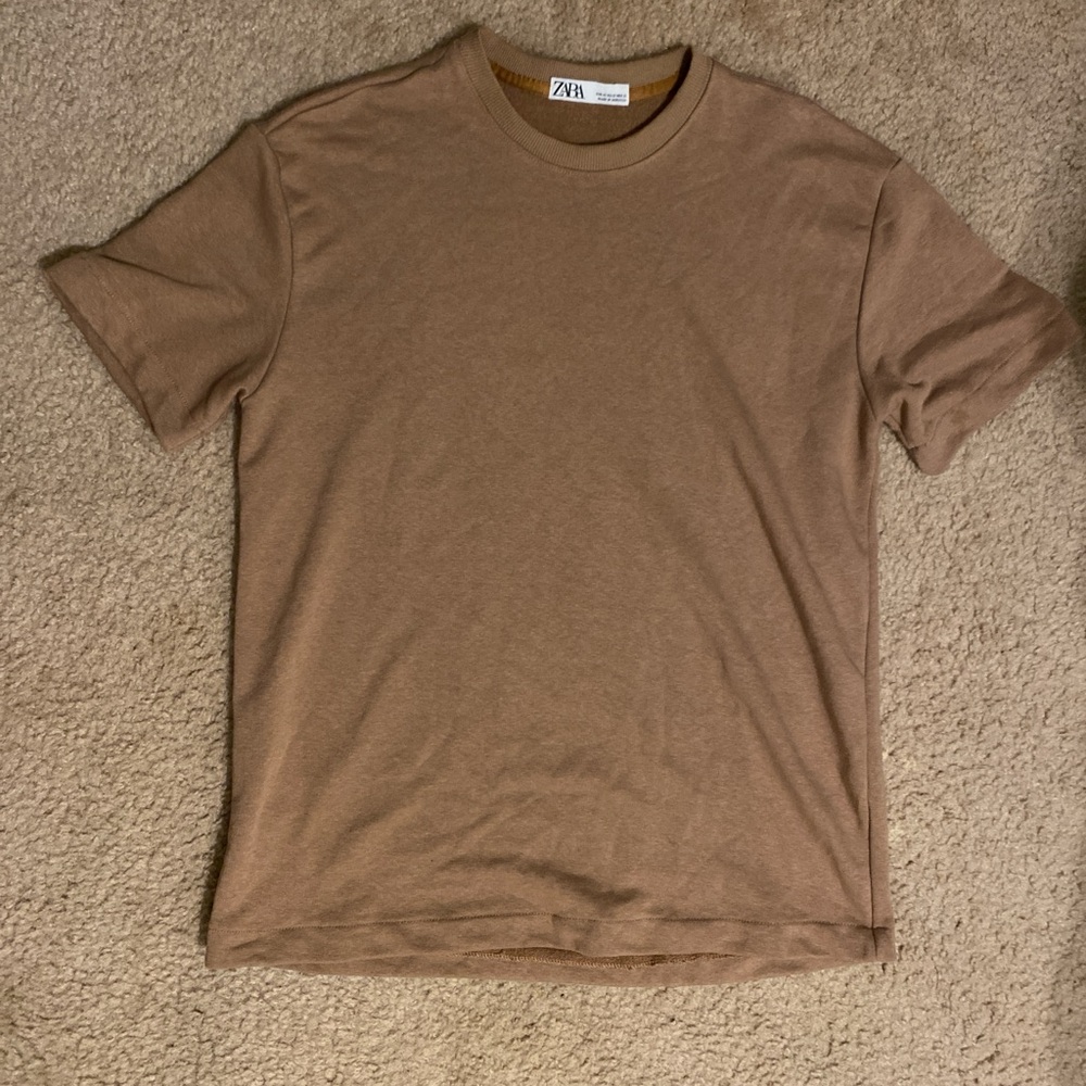 tan shirt
